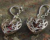 Ornate heart shaped drop earrings