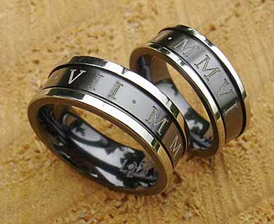 Outer engraved two tone wedding rings