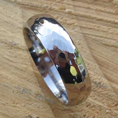Polished hammered titanium wedding ring