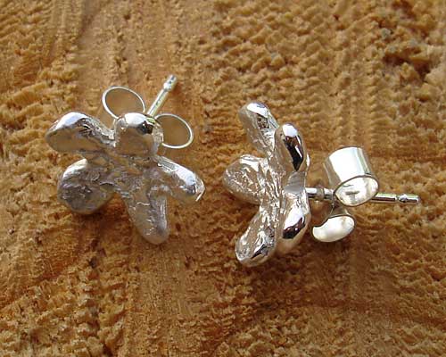 Silver designer stud earrings