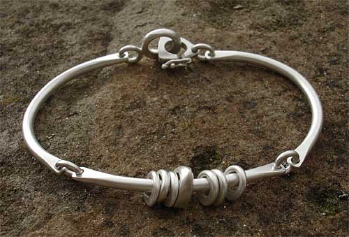 Womens designer silver bracelet