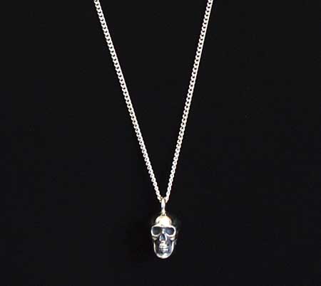 Human skull necklace