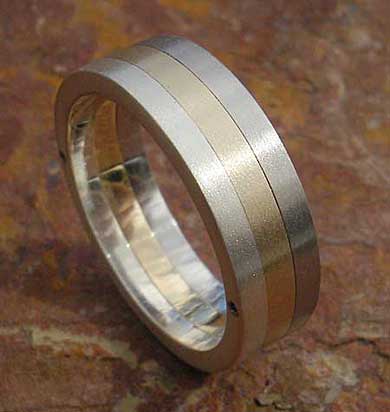 Steel gold and silver wedding ring