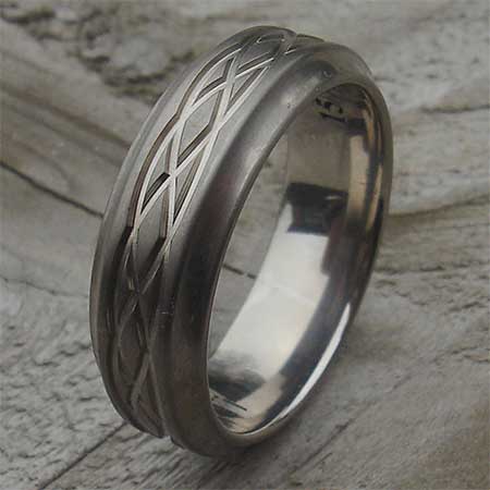 Stepped profile Celtic titanium ring