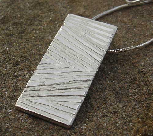 Textured silver necklace for women