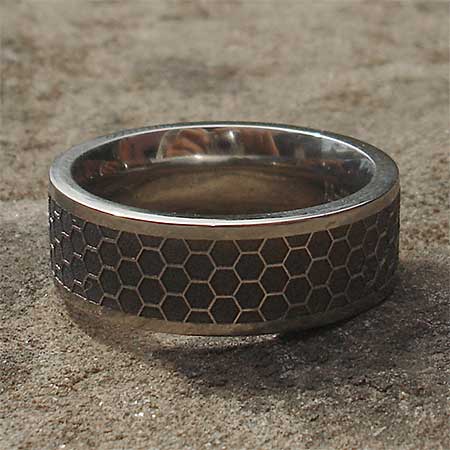 Honeycomb titanium ring