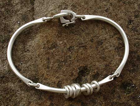 Unusual womens silver bracelet