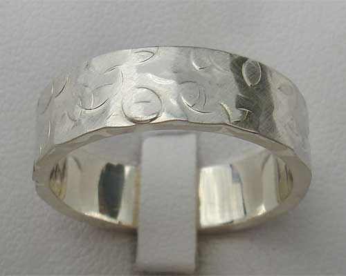 Unique hammered silver wedding ring