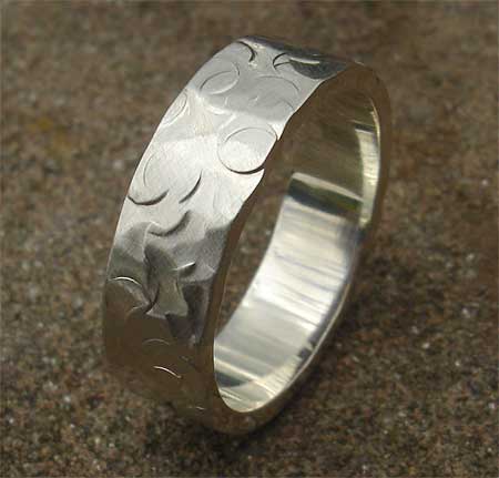 Unique hammered sterling silver wedding ring
