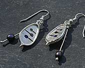 Unique silver Celtic hook earrings