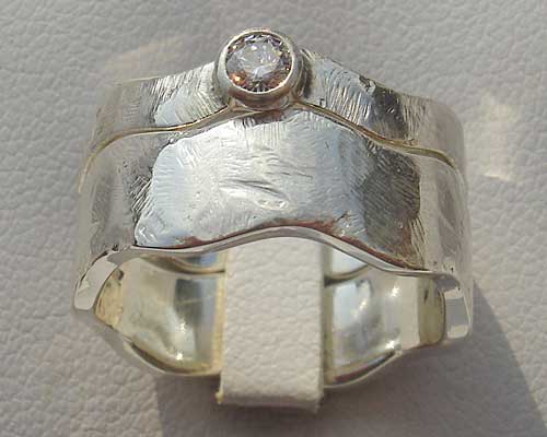 Unique silver engagement and wedding ring