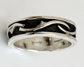 Bold and distinctive unusual thorn-themed silver ring