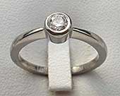 Unusual bezel titanium engagement ring