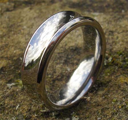 Unusual concave titanium wedding ring