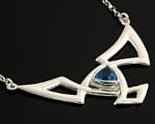 Unusual necklace featuring a striking geometric design in silver