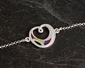 Unusual heart styled silver chain bracelet