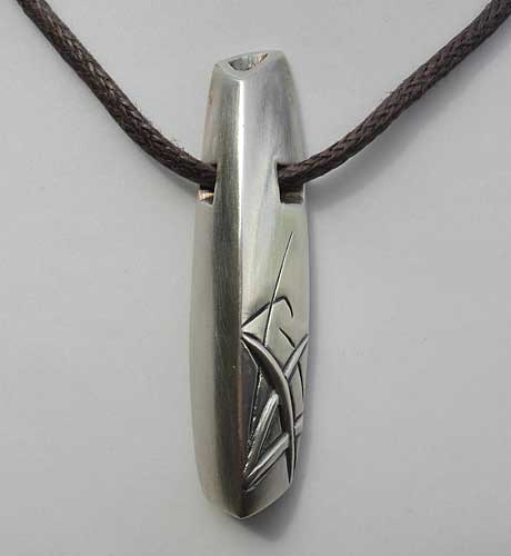 Unusual mens solid silver pendant