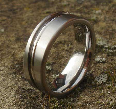 Unusual contemporary plain wedding ring