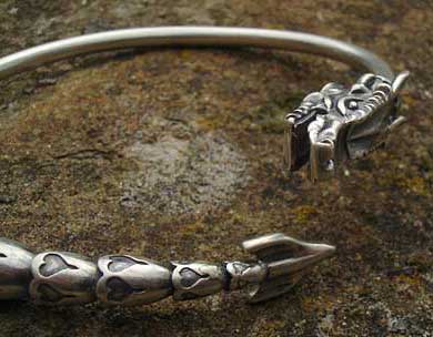 Unusual silver dragon charm bracelet