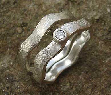 Unusual silver engagement and wedding ring
