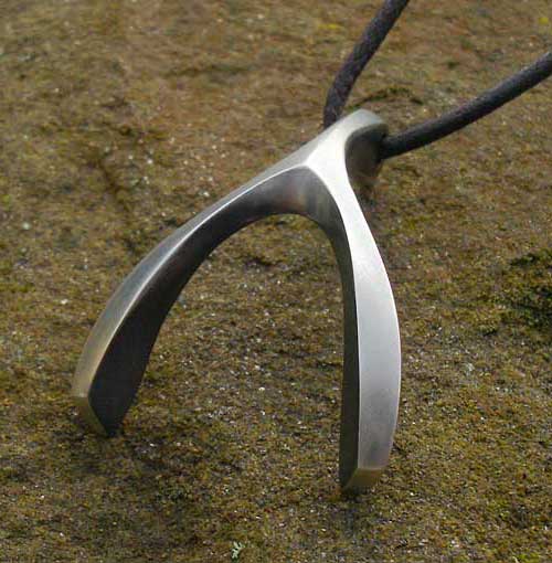 Unusual silver wishbone necklace