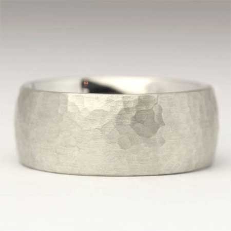 Wide beaten silver wedding ring