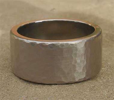 Wide hammered titanium wedding ring