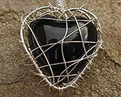 Womens black heart silver necklace