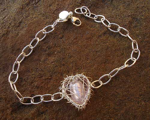 Womens caged heart silver bracelet