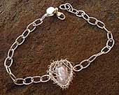 Womens caged heart silver bracelet