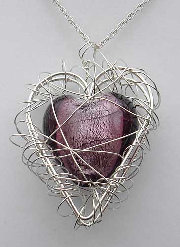Womens caged heart silver necklace