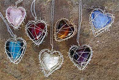 Womens caged heart silver necklaces