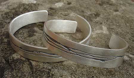 Womens contemporary silver cuff bracelets