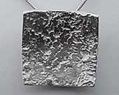 Womens rocky texture silver pendant