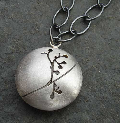 Womens silver etched pendant