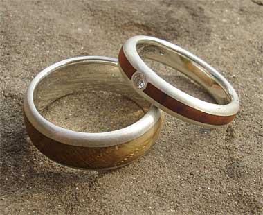 Wooden wedding ring and wooden engagement ring